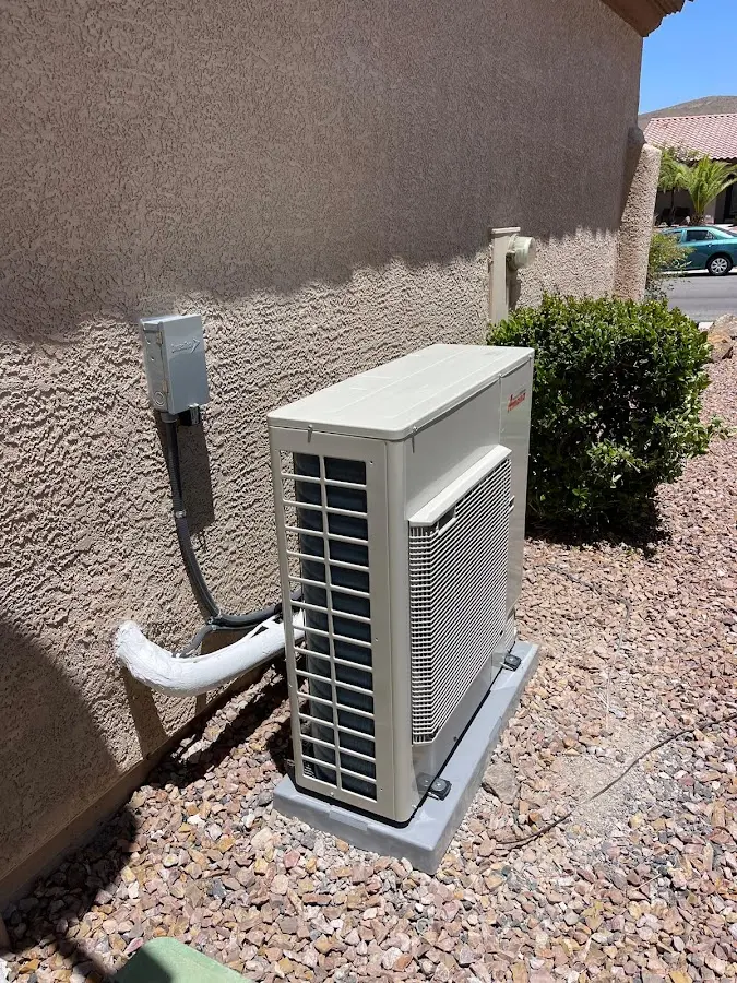 Residential air conditioning condenser unit in St. John
